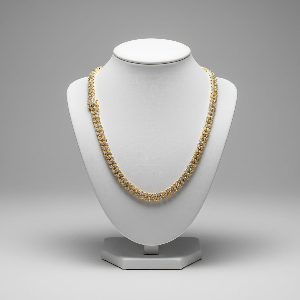 Gold chain necklace on a white background